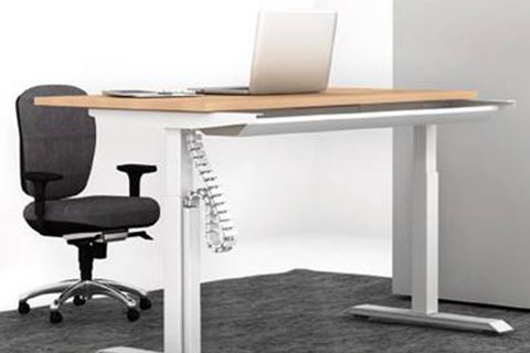 desk with a chair in an office
